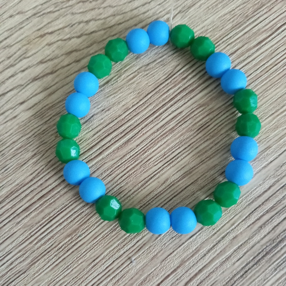 hand crafted Bright blue and green crystal beaded statement bracelet